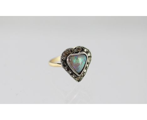 An opal and diamond heart shaped cluster ring, the central opal within a surround of eight cut diamonds, all set in white met