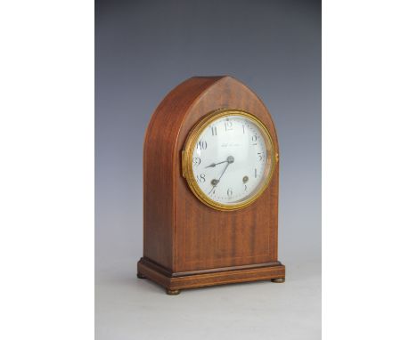 An Edwardian mahogany lancet shaped mantel clock, with enamel Arabic dial signed Seth Thomas, eight day movement, 29cm