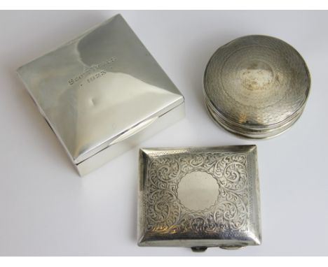 A silver presentation, cigarette case engraved 'Scott Trials 1923', enclosing photographs of the 1923 Scott Trials winner on 