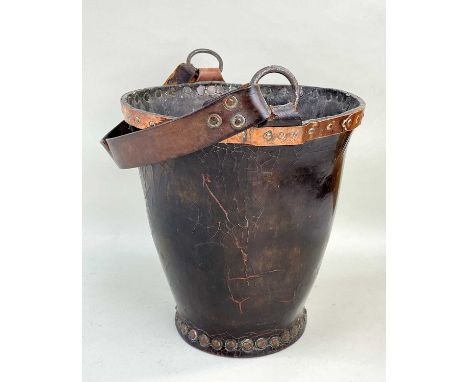19TH CENTURY LEATHER FIRE BUCKET, copper studded, iron ring handle, 33cms highProvenance: private collection SwanseaCondition