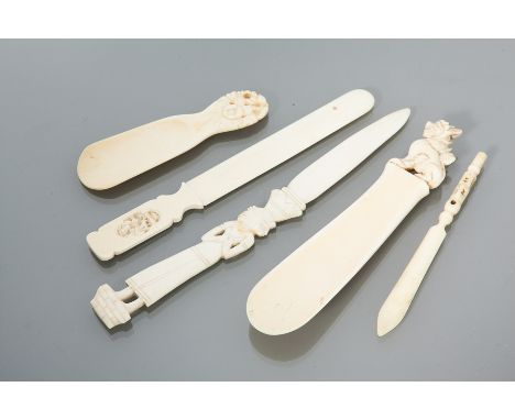CHINESE IVORY LETTER OPENER AND TWO SHOE HORNS
along with an Indian ivory letter opener and an ivory manicure tool (5) 