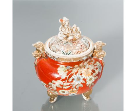 JAPANESE SATSUMA KORO
the cover with foe dog finial and floral decoration, on three feet, three character mark to base, 17cm 