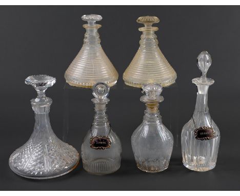 A pair of cut glass ship’s decanters and stoppers, first half 20th c, 22cm h and four other cut glass decanters and stoppers,