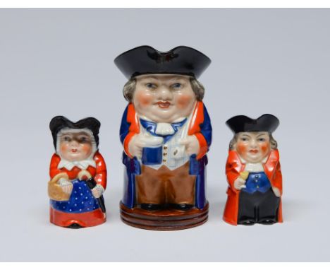 One and a pair of Royal Worcester toby jugs and companion, 1926, 1930 and 1938,&nbsp; 9 and 14cm h, printed mark and shape No