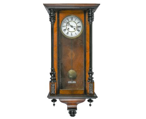 A walnut and ebonised Vienna regulator,&nbsp;c1900,&nbsp; with enamel dial, pendulum, 89cm h  