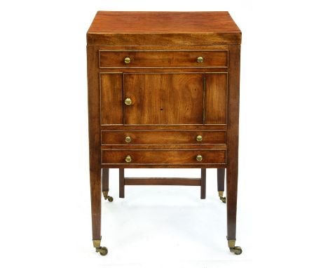 A George III mahogany dressing commode, the lid enclosing retractable mirror, the front with an arrangement of cockbeaded bli