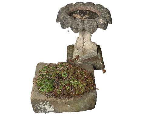 A reconstituted bird bath,&nbsp; on a square plinth, 60cm, 50cm diam and a sandstone trough, 18cm h; 38 x 40cm (2)  