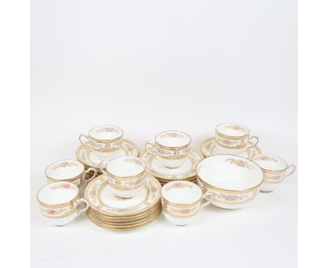 A Wedgwood gilded porcelain part tea service, model no. W192 