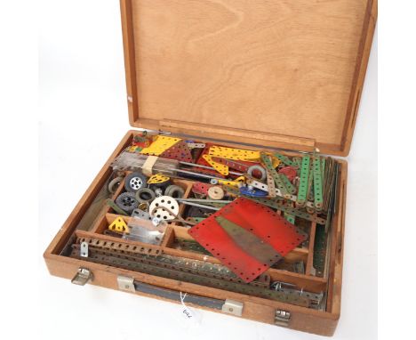 A wooden case of Vintage Meccano 