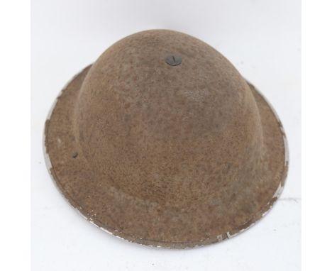 A Second World War Period British Army steel Brodie helmet 