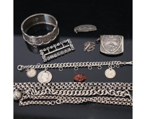 A tray of silver jewellery, to include an engraved and embossed bangle, silver Alberts, bracelets etc 