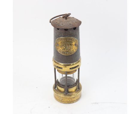 A brass and iron miner's lamp, by F Thomas & Williams Ltd of Aberdare, height 25cm 