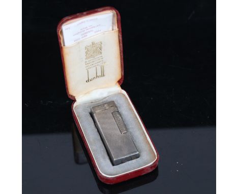 A Dunhill silver plated lighter, in original box 