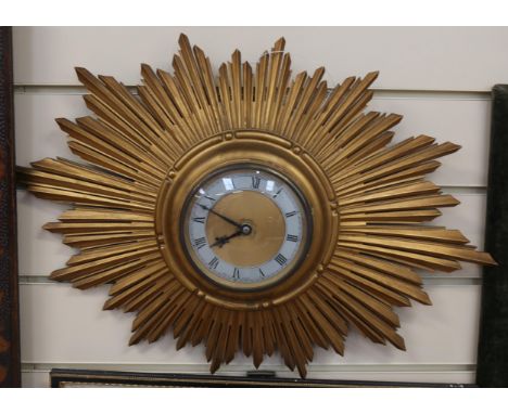 A Vintage gilt sunburst wall clock, width 50cm 