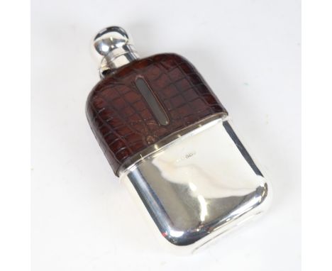 A late Victorian crocodile skin and silver-mounted hip flask, with silver cup, inscribed to the base of the cup Bosun to Mate