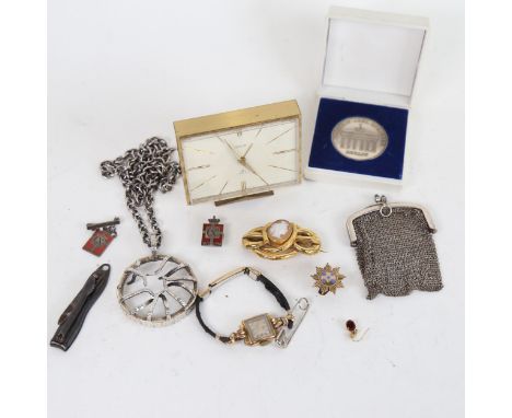 A Swiza 8-day clock, Georg Jensen silver and enamel badges, a relief carved cameo brooch, mesh purse etc 