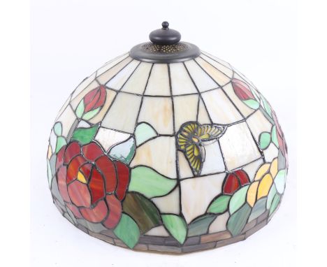 A large Tiffany style leadlight butterfly and roses lamp shade, diameter 40cmNo major losses, a few of the panels have cracks