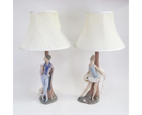 A pair of NAO porcelain table lamps with shades, height 59cm overall 