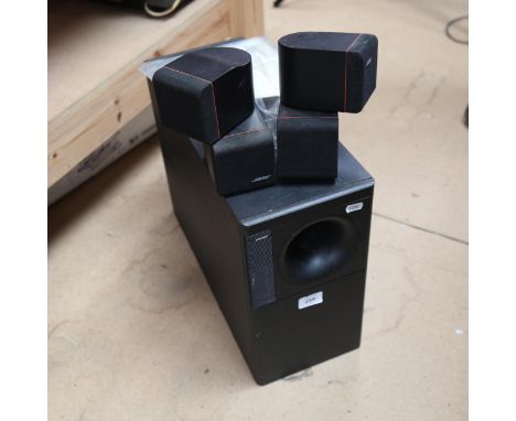 BOSE - an Acoustimass 5 Series II speaker system, comprising 1 x pair cube speaker arrays, 1 x Acoustimass module, boxed 