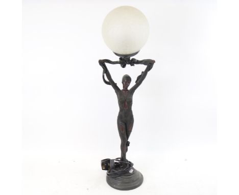 A modern bronzed resin Art Deco style dancing lady table lamp, with crackle-glass globe shade, overall height 64cm 