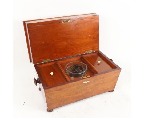 An unusual Victorian mahogany double-compartment sarcophagus tea caddy, top layer concealing velvet interior, lower lid conce