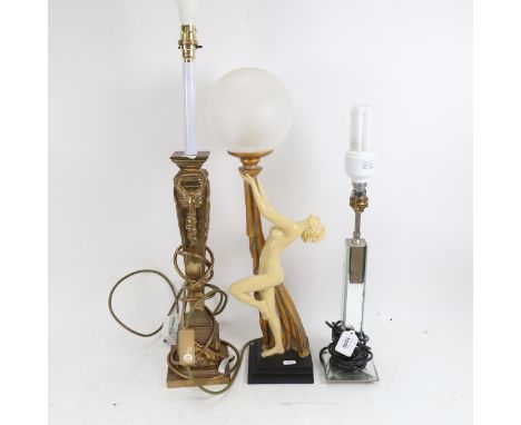 A Classical design gilded table lamp, an Art Deco style table lamp with globe shade, and a mirrored glass lamp 