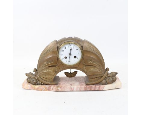 A French Art Deco gilded spelter 8-day mantel clock, maker JR of Paris, on pink veined marble plinth with movement striking o