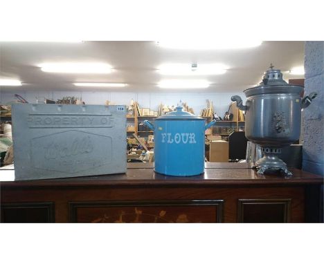 An enamel 'Flour' bin, a Wall's Ice Cream container and an urn. (3)