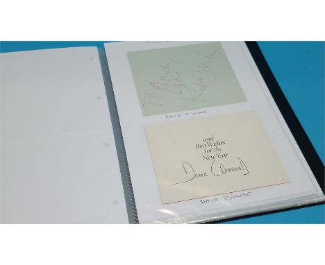 Autographs - A collection of 61 signed photographs and signatures including Arnold Schwarzeneggger, John Travolta, Peter O'To