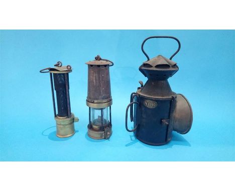 An NER lamp and two Miner's lamps.