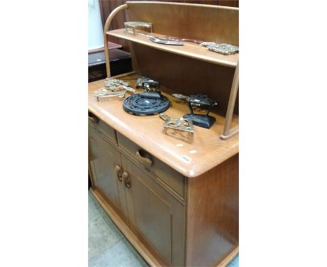 A small Ercol style light oak dresser.  91cm
