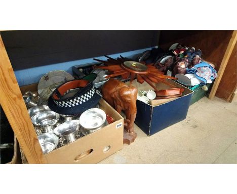 Four boxes including clocks, dolls, light shades etc.