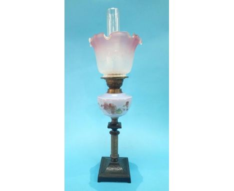 A Victorian oil lamp.