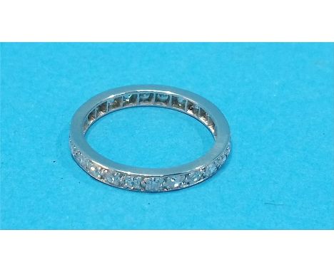 A platinum diamond full eternity ring.