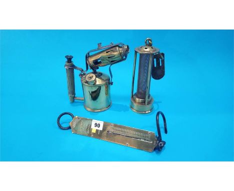 A Miners lamp, Salter scales and a blow lamp.