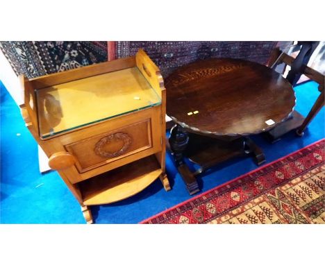 An oak standard lamp, two coffee tables, an oval occasional table etc.