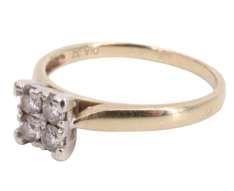 A contemporary diamond ring, comprising a square arrangement of four pave-set diamond brilliants of approx .32 ct aggregate w
