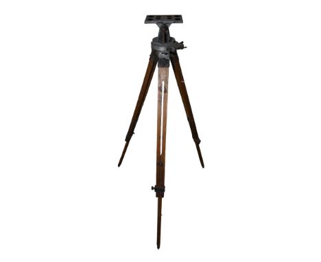 A surveyor's oak and cast aluminium tripod