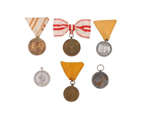 A group of Austrian medals, comprising two Austrian Great War commemoratives, two Imperial Austrian Fire Service medals, an I