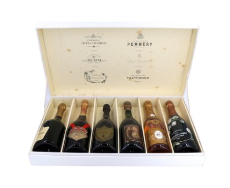 A Relais &amp; Chateaux cased collection of vintage Champagne, comprising Moet et Chandon "Cuvee Dom Perignon Vintage 1985", 