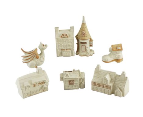 A quantity of Shelf Pottery Ltd ceramic money boxes, 23 cm tallest 