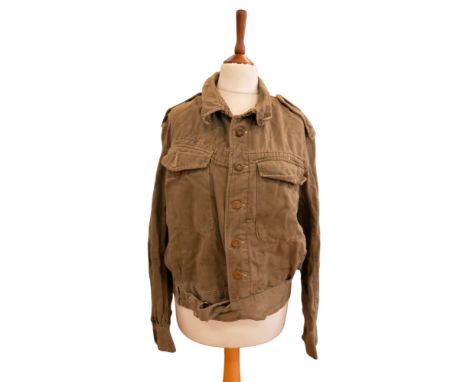 A 1943 dated British army denim overall blouse