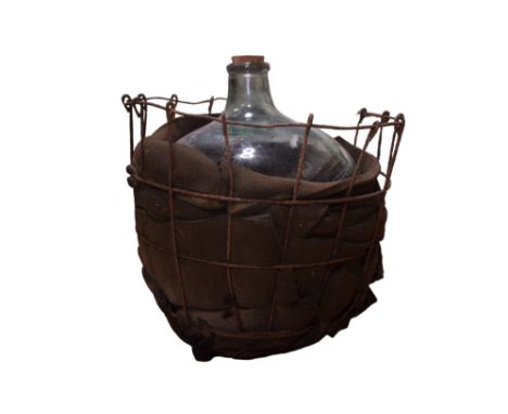 A vintage glass car-buoy and cage, 52 x 60 cm