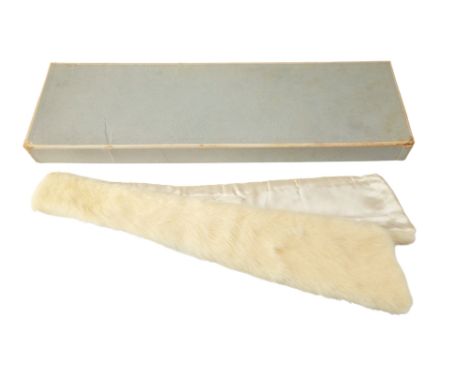 A boxed 1960s mink tie, awarded as a prize from Smith and Nephew Ltd, including a supporting letter and booklet, 80 x 8 cm