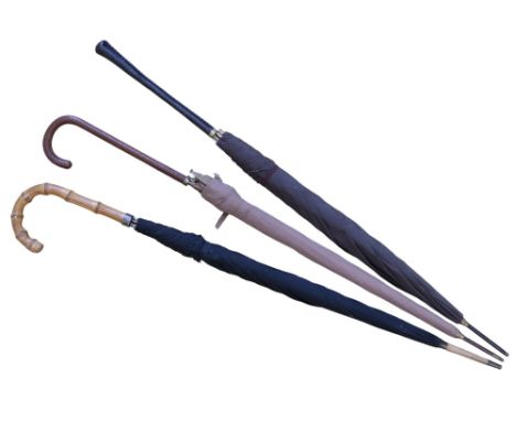 Three vintage umbrellas