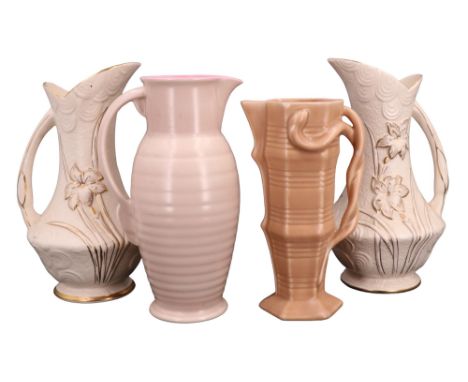 A pair of Arthur Wood jugs together with two other flower jugs