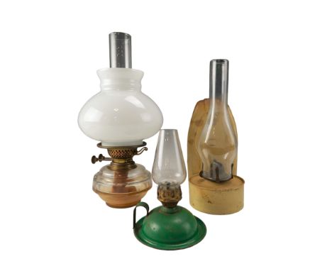 A late 19th / early 20th Century Young's glass oil lamp, having a milk glass shade, together with an aluminium wall mounting 