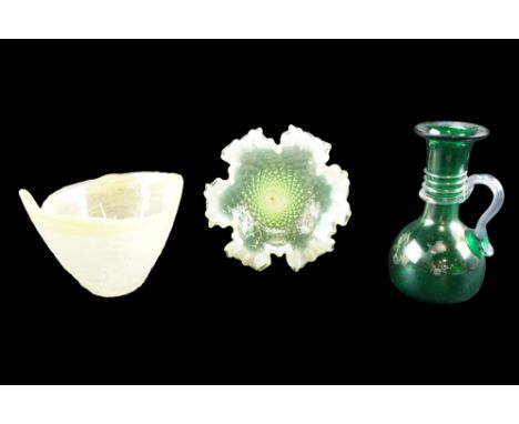 A yellow vaseline glass epergne flute together with a similar bowl and a free-blown green-glass lustre flower jug having appl