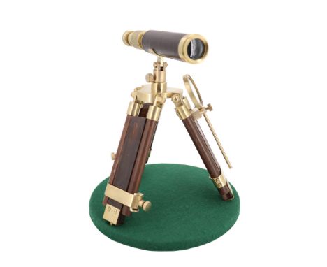 Lot 247 - Reproduction brass telescope on a tripod