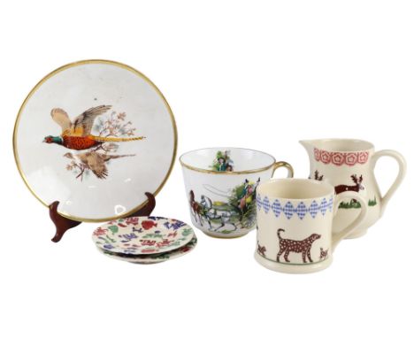 A large contemporary teacup and saucer by Hammersley and Co, the decoration depicting a coaching scene and a pheasant, togeth